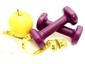9181702-healthy-lifestyles--apple-and-weights-with-measuring-tape
